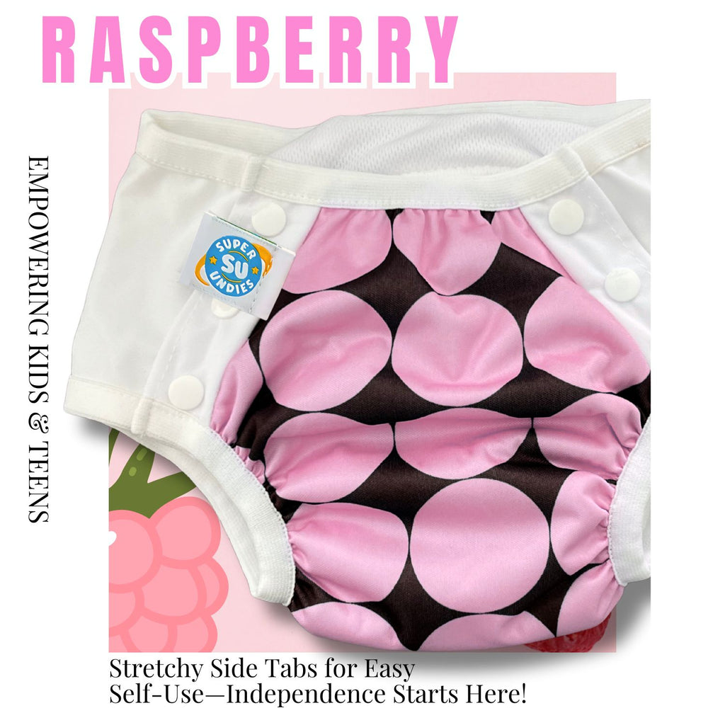 Reusable diaper for older children with pink raspberry pattern on a pink background, featuring the Super Undies brand.