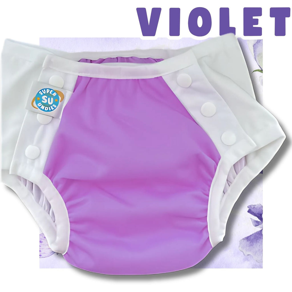 Purple big kid diaper with white buttons on a white background, featuring the brand Super Undies 